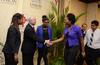 Desirae Suggs, senior business administration major, greets Robert M. Gates, former U.S. secretary of defense, after the 15th Annual Scholarship Banquet. - Photo by Jacob Moore