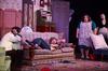The cast of <em>A Barrel Full of Pennies</em> performs a scene from the comedy. - Photo by Zac Calvert