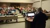 David S. Dockery, president of the university, answers questions from students at a Student Senate meeting in Harvey Auditorium. - Photo by Jacob Moore