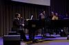 Cody Curtis, assistant residence director, leads worship music during the final chapel of Faith in Practice week.  - Photo by Anne Richoux