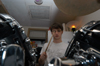 04/94/04 - Greenwood drummer Jesse Florida plays the drums in the kitchen during the Room of Rock concert held in Crook 12.