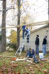 11/6/12 - Engineering students work on building a swing set for the East Chester site of Mission Jackson, an outreach program of Englewood Baptist Church, during the tenth annual Campus and Community Day. - Anne Richoux