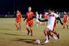 Felipe Araujo attacks the ball during the semifinal round game in the NCCAA mideast region tournament. - Photo by Anne Richoux