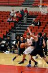 Anthony Freeman dribbles around Central Baptist players during the Bulldogs season opener, which Union won 86-70.  - Photo by Anne Richoux