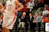 James Patterson, honorary coach and associate dean of the school of theology and missions, cheers for the Bulldog basketball team alongside assistant coach Trevor Lydic and head coach David Niven during a game against Central Baptist College. - Photo by Anne Richoux