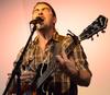 Trenton Wheeler, lead singer of Seryn, performs during a concert at Barefoots Joe. - Photo by Olivia Wallace