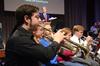 Phillip Lundy, freshman biblical studies major, plays with the Symphonic Band during chapel. - Photo by Zac Calvert