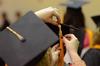 Graduates adjust their tassels before Fall Commencement held at West Jackson Baptist Church. - Photo by Jacob Moore