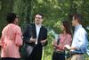 Keith Bates, associate professor of history, chats with some of his students in the Grove. - Photo by Kristi McMurry