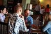 Scott Huelin, associate professor of English and director of the honors community, meets with several students in Barefoots Joe. - Photo by Kristi McMurry
