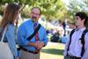 9/11/12 - Scott Huelin, associate professor of English and director of the honors community, stops outside to chat with a couple of students. - Kristi McMurry