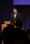 Chris Townson, director of Project 52 and Nehemiah Teams, leads prayer after speaking in chapel. - Photo by Jacob Moore