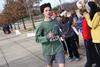 Alex Wainscott, junior Engineering major, crosses the finish line at the Chi Omega 5k during Homecoming weekend. - Photo by Matt McDaniel