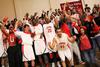Pedro Faller and his teammates celebrate their homecoming victory over the Shorter University Hawks with all of the fans that came out to support them. - Photo by Matt McDaniel