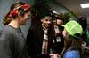 Hip hop artist Dee-1 takes time to talk with students Emily Russell and Caisie Jordan after the Homecoming concert.  - Photo by Anne Richoux