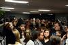 Students and guests fill the lobby, waiting to talk to hip hop artist Dee-1 and other performers after the Homecoming concert. - Photo by Anne Richoux