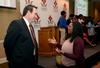 Rachel Woodard, freshman nursing major, talks with John Bryson, teaching pastor at Fellowship Memphis church, after the sixth annual Black History Month Celebration held in the Carl Grant Events Center. - Photo by Jacob Moore