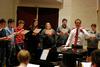 2/26/13 - The University Singers practice under the direction of Chris Mathews, associate professor of music and department chair. - Anne Richoux