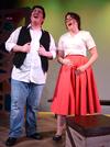 Barry DeCoursey, freshman music major, and Heather Frye, freshman psychology major, perform together in the W.D. Powell Theatre production of Cotton Patch Gospel.  - Photo by Olivia Wallace