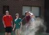 John Monroe, freshman psychology major, drives a foam golf ball on the Heritage Complex lawn. - Photo by Jacob Moore
