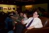 Chris Blair, professor of communication arts and coordinator of DMS, laughs with the crowd while hosts at the Student Film Festival crack jokes in between giving out awards. - Photo by Jacob Moore