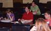 Business students listen to a lecture and participate in discussion during class. - Photo by Olivia Wallace