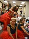 Members of Chi Omega add glitter spray to their hair before the 16th annual Variety Show. - Photo by Jacob Moore