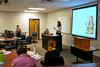 Courtney Rankin, senior sociology major, presents her research project during the Scholarship Symposium. - Photo by Anne Richoux
