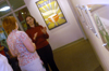 Senior Kerrie Brooks discusses her senior show in the Art Gallery. - Photo by Lindsay Stavish