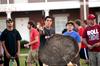 10/276/13 - Riley Pope, sophomore media communications major, attempts the hatchet toss competition during the Great Outdoors residence life event. 
