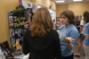 Freshman Cara Yates shares information about the ZTA sorority with an incoming freshman during The Spring Thing Weekend. - Photo by Jonathan Blair