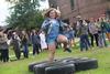 10/290/13 - Tori Cagle, freshman Spanish education major, hops through the tires in the obstacle course during the DF Olympics in the Heritage Complex.