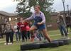 10/290/13 - Morgan Marlar, freshman athletic training major, races through the tires in the obstacle course during the DF Olympics in the Heritage Complex.
