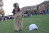 10/290/13 - Ashley Payton, senior social work major, hops around the trash bag in the potato sack race during DF Olympics in the Heritage Complex.
