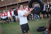 10/290/13 - Jeff Williams, freshman, prepares to throw the tire as far as he can in the tire throw competition during the DF Olympics in the Heritage Complex.