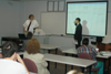 Seniors Justyn Hunter and Milan Zivkovic, computer science majors, present <i>Troubleshooting Your Health:  Automate a Nursing Process</i> during the university's first scholarship symposium.  - Photo by Justin Veneman