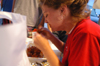 Lauren Oldham eats a very hot batch of hot wings at Buffalo Wild Wings during a challenge at the Watters Amazing Race.
 - Photo by Jonathan Blair