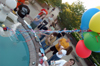 05/7/04 - Students sometimes thrown suprise birthday parties for their friends in creative ways. Here students celebrate a birthday around the fountain.