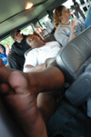Freshman Ray Jones takes a quick nap in the van as he and other comptetiors endure the Road Trip to Nowhere sponsored by the Young Alums. - Photo by Jonathan Blair