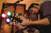 04/94/04 - Greenwood's Tyler Malone and Art Wong jam during the Room of Rock held in Crook 12.