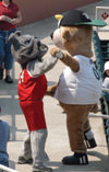 08/25/03 - Buster plays with fellow mascot Ribbie at Union Night at the West Tennessee Diamond Jaxx ballpark.