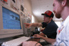 Broc Barnes and Micah Moyers work together on their Student Award winning <i>Union:911</i> for the first Digital Media Studies Society Film Festival. - Photo by Justin Veneman