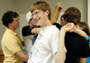 Freshman Ryne Cali gets tangled up in a FOCUS group exercise during FOCUS '04. - Photo by Kristen Hiller