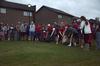 10/287/14 - Freshmen guys compete in the sack race at the annual DF Olympics on the Heritage Complex lawn.