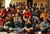 12/343/14 - Students gather in McAfee Commons prior to Christmas with the Olivers.