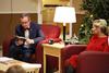 12/343/14 - Dub Oliver, president of the university, reads a passage from Luke 2 to the students gathered in McAfee Commons for Christmas with the Olivers.