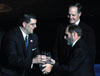 James Ayers, co-chairman of the recently completed <i>Building a Future</i> campaign, receives an engraved crystal vase presented by Charles Fowler and Mike Weeks during the Scholarship Banquet.  - Photo by Lindsay Stavish