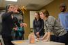 03/62/15 - MacLin Williamson, sophomore biology major, attempts to complete a station during Minute to Win it, hosted by Residence Life in the McAfee Commons.