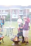 04/117/15 - Students gather around a fire during Residence Life's Field Day, where the winner of the Union Cup would be announced. 