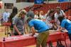 08/226/15 - Residence Assistants check in new students during new student move-in day in the Fred Delay Gymnasium.